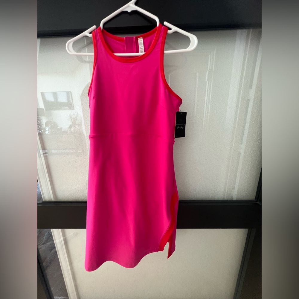 Sage collective NWT size medium - color pink flame, shorts attached underneath.